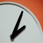 Clock hands representing time while pointing to the truth that the Everlasting God exists beyond time with no beginning or end.