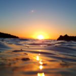 Sunrise over the ocean reflecting the God of Order, who sets the rhythm of day and night and brings structure to all creation