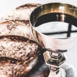 Communion bread and cup symbolizing God’s Promises fulfilled through the new covenant in Jesus Christ.
