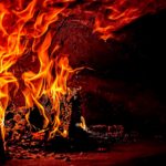 Flames of fire representing trials and hardship, reminding us that Jesus is the First and the Last who has ultimate authority over all things.