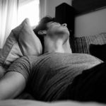Man resting with his eyes closed, illustrating Jesus’ teaching that death is like sleep and that He raises the dead in Christ to eternal life.