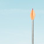 Single arrow against a blue sky, representing Jesus as God’s select arrow sent to defeat the works of the devil and save our souls.