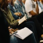 Believers gathering to hear the Word of God.