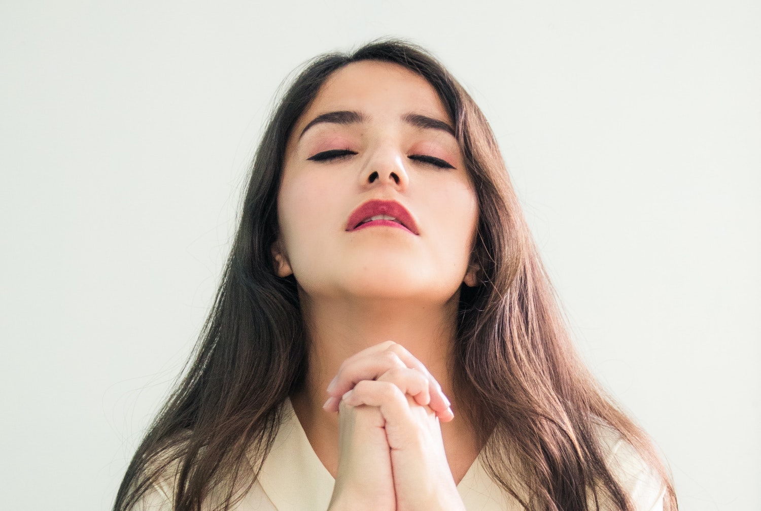 A woman praying.