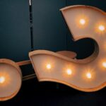 Illuminated question mark symbolizing the question of satisfaction, pointing to Jesus as the propitiation for our sins who satisfied God’s righteous requirements.