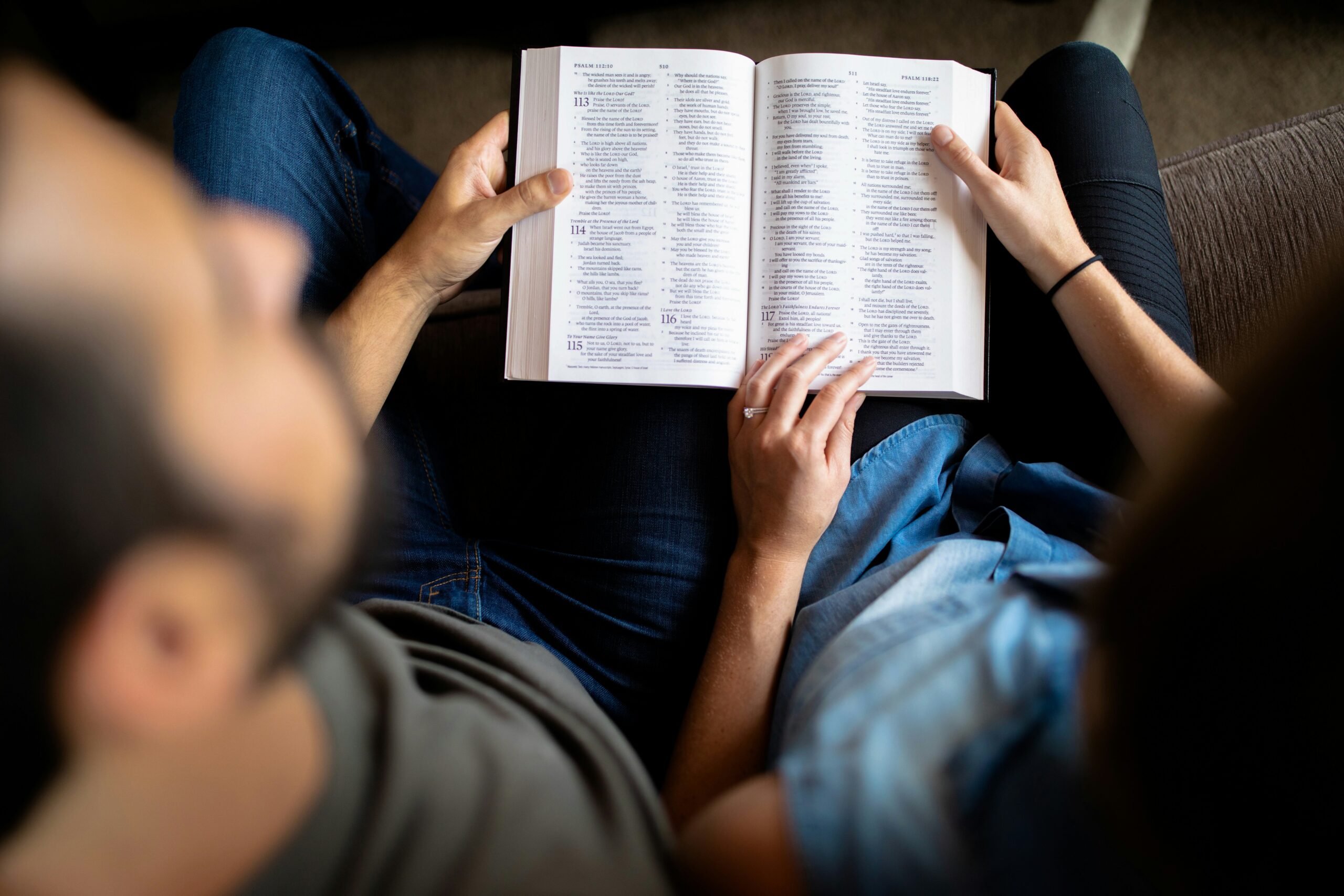 Husband and wife reading the Bible together