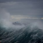 Stormy ocean waves illustrating God as our present help in trouble, ready and reliable when life feels overwhelming.