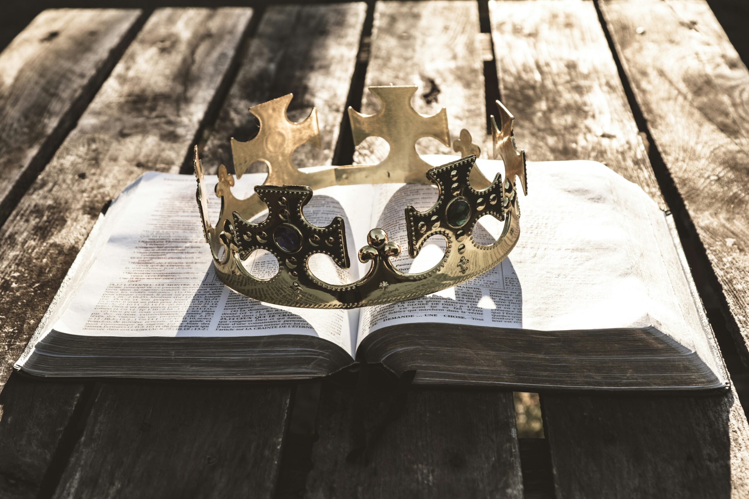 Crown resting on an open Bible symbolizing the Lord as the Diadem Of Beauty and crown of glory for His people.